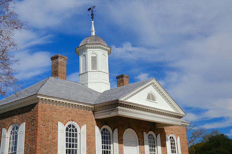 Williamsburg VA - Colonial Historical Building with Steeple with Blue Sky